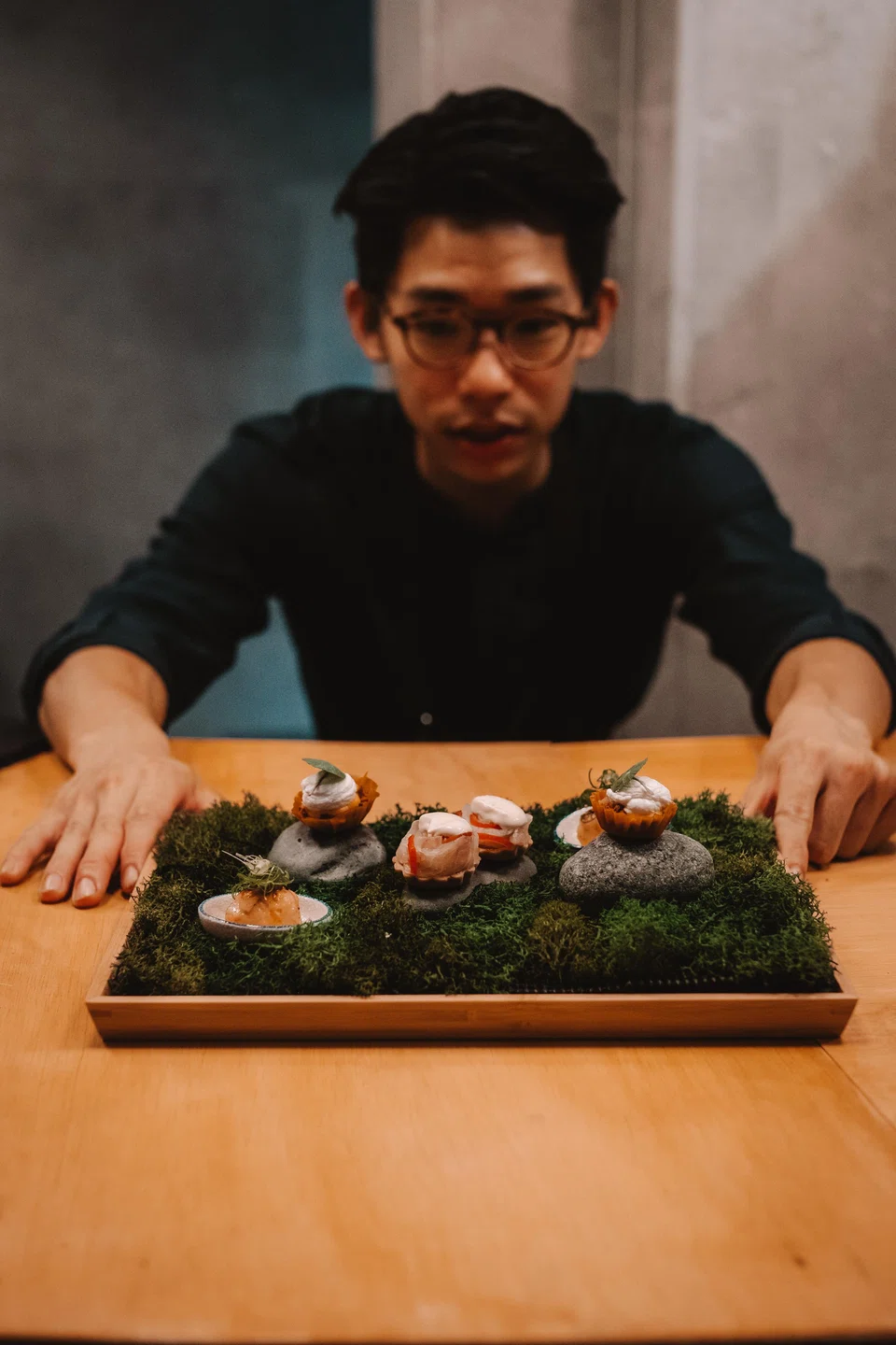 Chef-owner Law Jia-Jun and his tray of snacks.