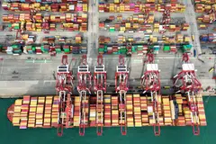 A ship at a port in Qingdao, China, on Oct 9, 2025. Chinese exports have hit new records in many markets this year, showing Beijing can survive without the US consumer.