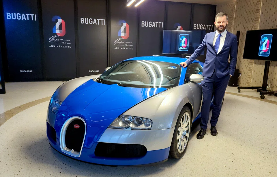 “We don’t plan to have a fully electric Bugatti at all,” says Bugatti Rimac CEO Mate Rimac, pictured here with the Bugatti Veyron hypercar.
