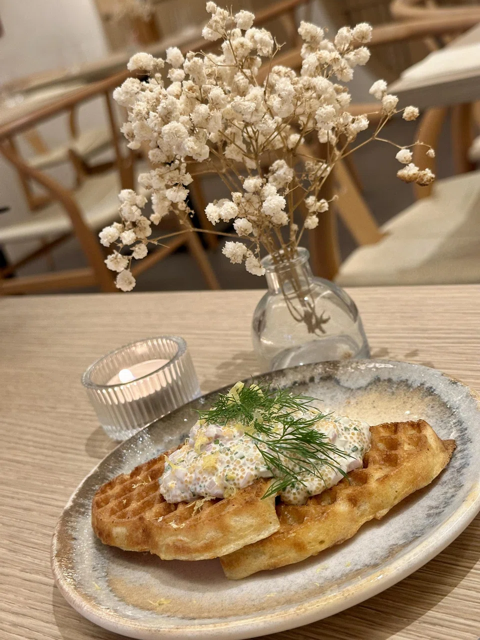 Waffles topped with creamy fish roe.