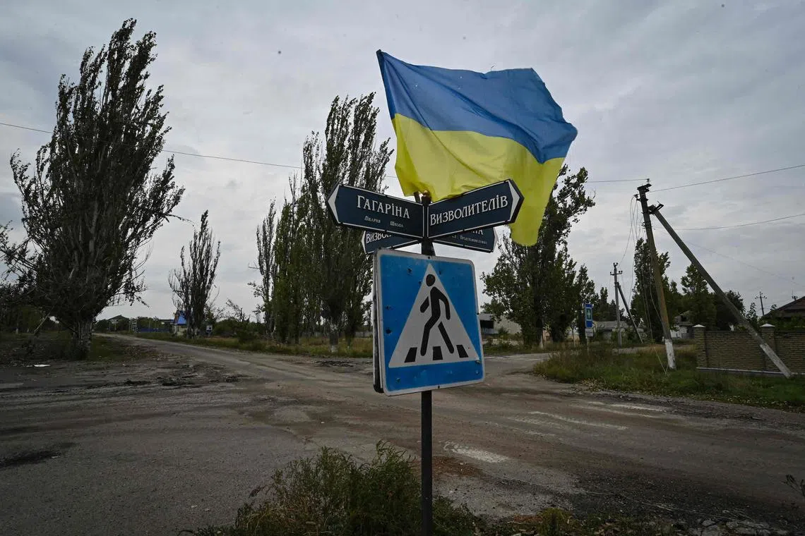 A Ukrainian flag waves on a street of the recently liberated village of Vysokopillya in the Kherson region of Ukraine. Ukraine’s tenacity shows how powerful liberal nationalism can be in the face of an authoritarian threat.