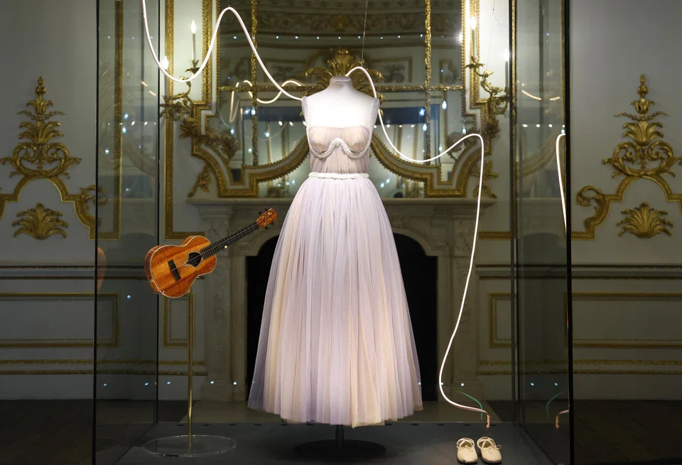 Items used in the ‘Speak Now’ World Tour and on the album cover photograph and loaned by Taylor Swift, which forms part of the Taylor Swift Songbook Trail exhibition celebrating the work of the music artist, are displayed at the V&A Museum in London.
