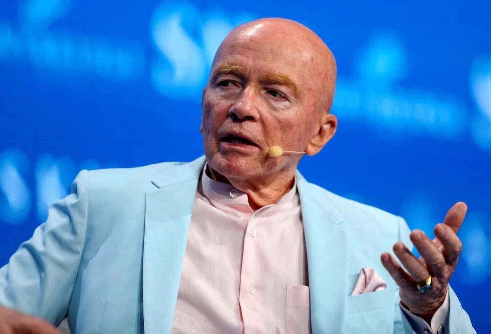 In a crowd of investing advisers, Mark Mobius (seen here in 2017) was distinctive in part for his impeccably shaved head, which inspired the nickname Bald Eagle.