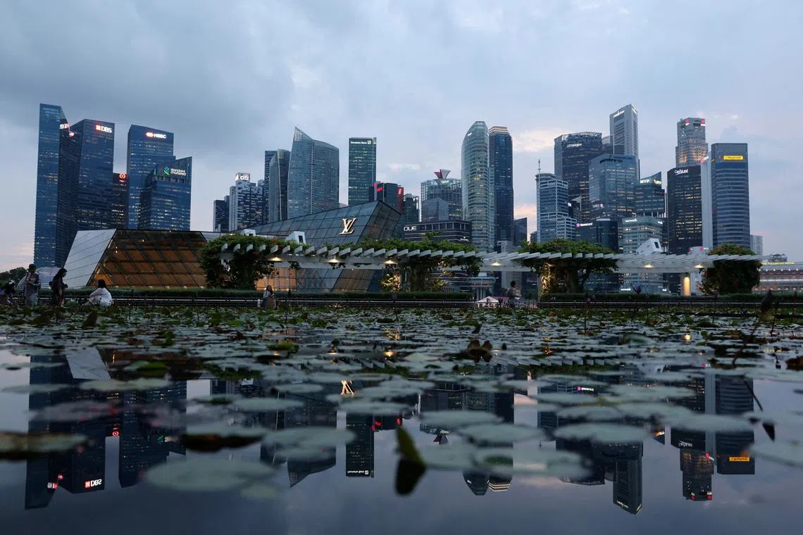 FILE PHOTO: A view of the central business district skyline in Singapore May 27, 2025. REUTERS/Edgar Su/File Photo