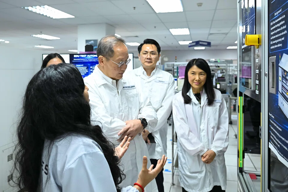 Manpower Minister Tan See Leng (third from right) during his visit to Thales Solutions Asia, which is one of the host organisations in the GRIT programme.