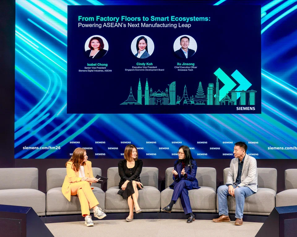 EDB's executive VP Cindy Koh (2nd from right) speaking at a panel session moderated by Siemen's customer communications project manager Christine Brunner (far left), alongside senior VP for digital industries Asean at Siemens Singapore Isabel Chong and CEO of Innowave Tech Xu Jinsong.
