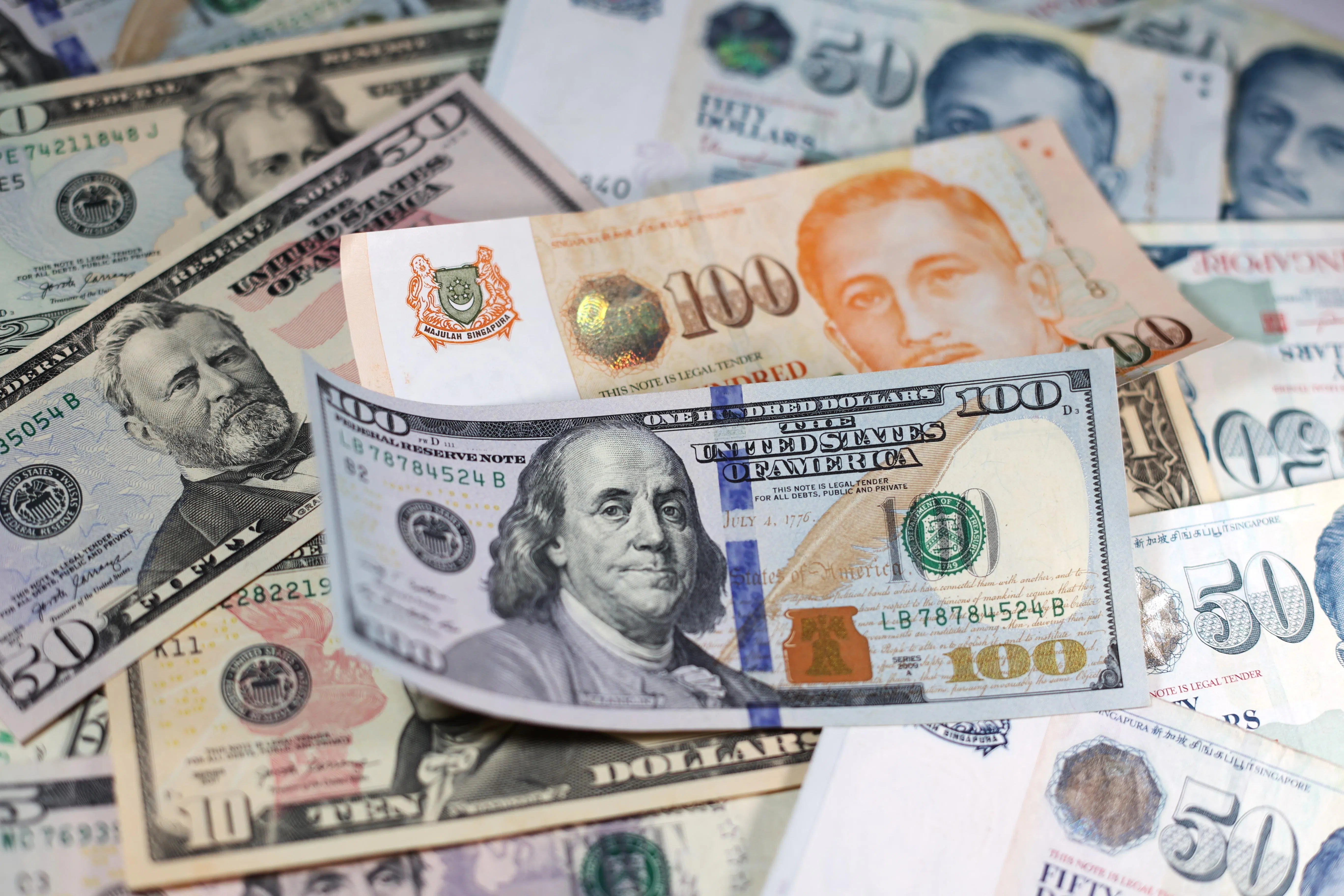 Singapore firms like Sats could see relief as US dollar declines, but SIA  may lose out - The Business Times