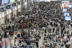 About 58 million cars are expected to be on roads every day during the five-day holiday in China, while the railways carried more than 20 million passengers on Wednesday alone.