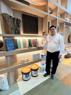 Buildo Engineering managing director Mike Wong with its cork-based construction products, which are greener than wood, functional and aesthetically pleasing.