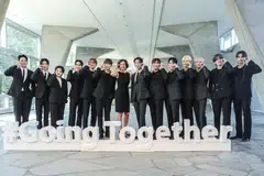 Unesco Director-General Audrey Azoulay (C) poses with members of the South Korean K-Pop group Seventeen during a photocall as part of their appointment ceremony as Unesco's goodwill Ambassador for Youth in Paris.
