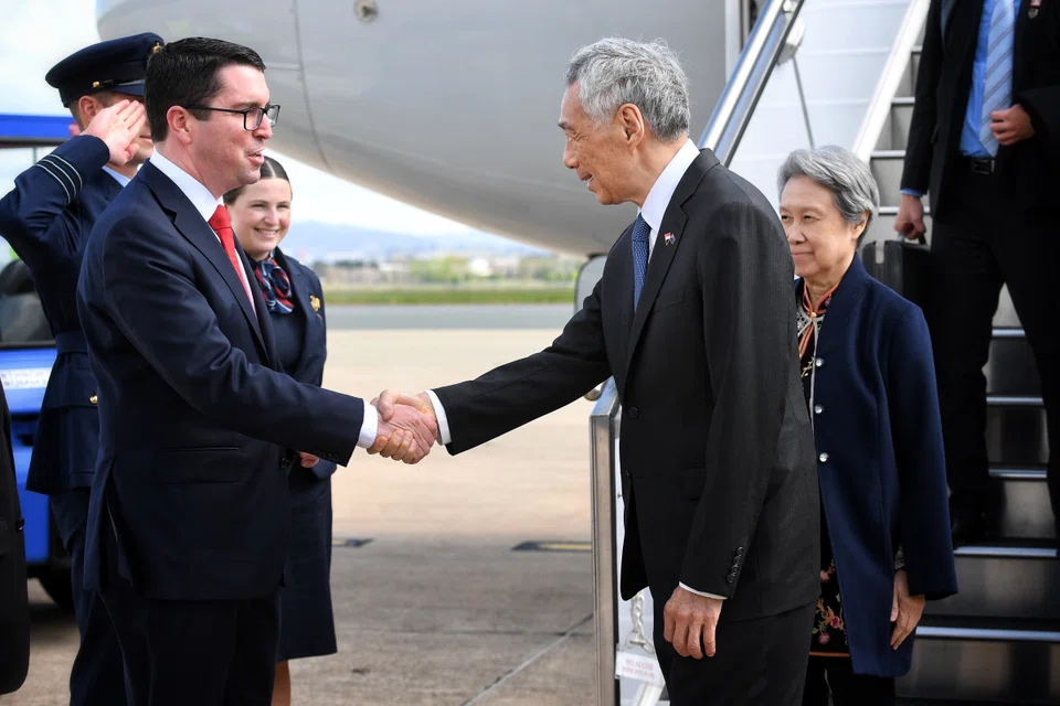 From left: Patrick Gorman, Australia's Assistant Minister to the Prime Minister, welcomes Prime Minister Lee Hsien Loong and Madam Ho Ching to Canberra.