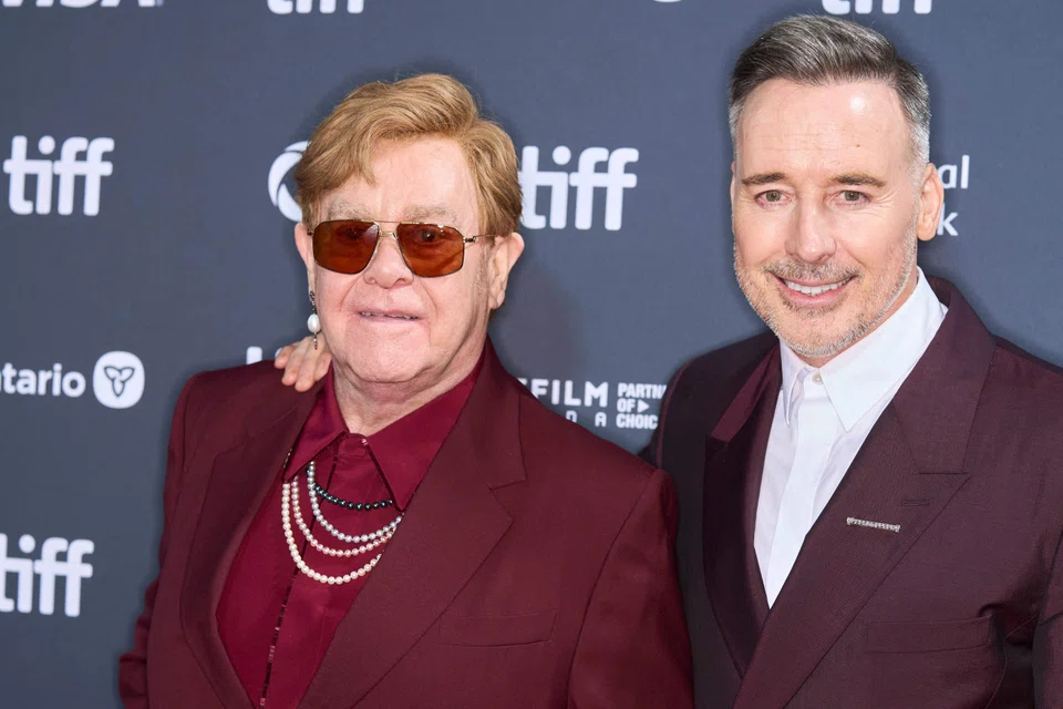 British singer-songwriter Elton John (L) and spouse, Canadian-British filmmaker David Furnish. “As some of you may know, I have had issues, and now I have lost my sight. I haven’t been able to see the performance, but I have enjoyed it,” John said, according to the Daily Mail. 