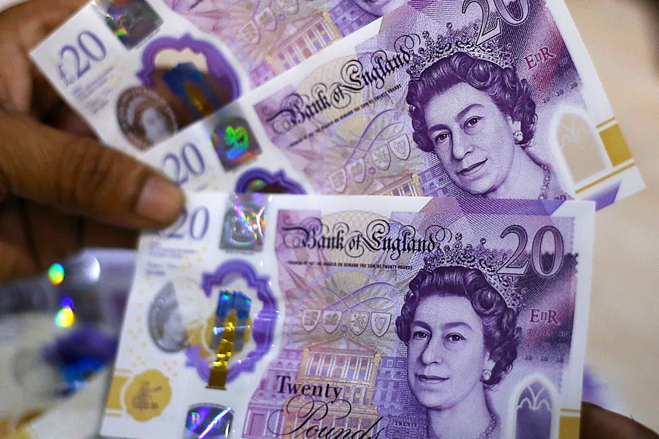 Notes with the late Queen Elizabeth’s image on them will be removed from circulation only if they become “worn or damaged,” the Bank of England said in a statement.