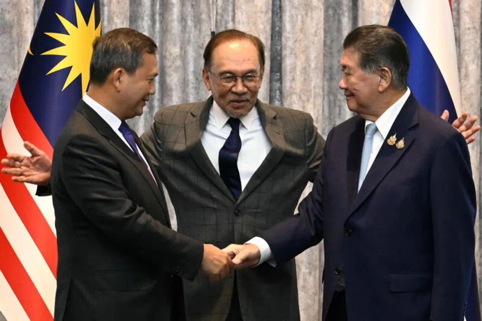 Thailand Acting PM Phumtham Wechayachai (right) and Cambodian PM Hun Manet (left) hold discussions in Malaysia, hosted by PM Anwar Ibrahim, who facilitated the dialogue in his role as chair of Asean.
