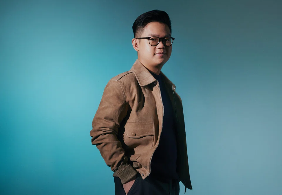 Theodoric Chew wears a bomber jacket, trousers and pullover, all by Berluti.
