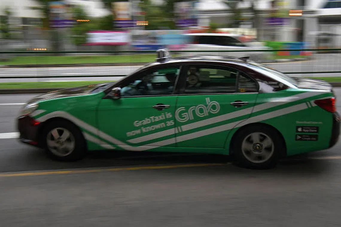 Singapore Budget 2018: Private-hire car services Uber and Grab may face regulations and licensing
