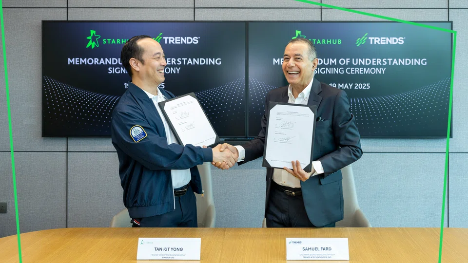 Tan Kit Yong (left), head of Enterprise Business Group at StarHub, with Samuel Fard, CEO and chariman of Trends & Technologies. The partnership is part of StarHub's broader strategy to grow its enterprise presence across the region through high-impact local collaborations. 