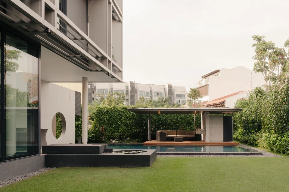 The home's lawn is shielded from prying eyes. 