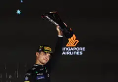 McLaren's Lando Norris celebrating after winning the Singapore Grand Prix in 2024. SIA has been the title sponsor of F1 Singapore for 11 years.
