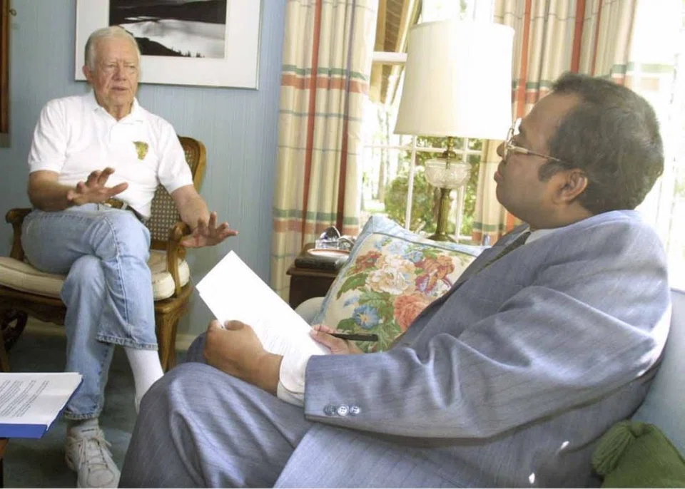 The writer interviewing President Carter at his home in Plains, Georgia, in July 2001.