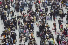 Passengers at the Hangzhou East train station in China. Around 270 million domestic trips were made during the five-day Labour Day holiday that ran from Apr 29 to May 3 this year.