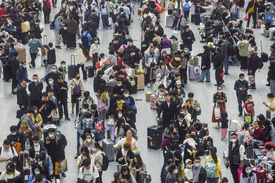 Passengers at the Hangzhou East train station in China. Around 270 million domestic trips were made during the five-day Labour Day holiday that ran from Apr 29 to May 3 this year.