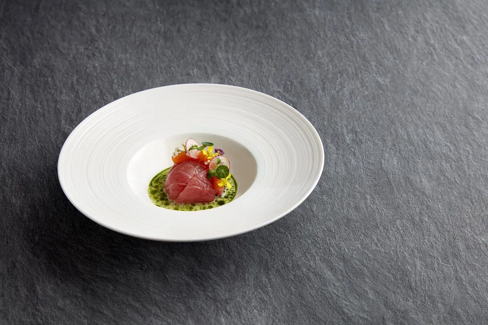 Kombu-cured tuna chutoro on the cable car dining menu.