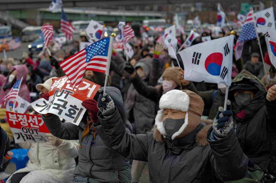Pro-Yoon protesters rally to support the impeached South Korean President Yoon Suk Yeol near his official residence in Seoul, South Korea, Jan 7, 2025.