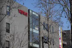 Overseas Chinese Town Enterprises told bondholders that Vanke's crisis has already impacted the property market this year.