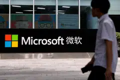 Microsoft is pulling back from the China market amid growing political and trade tensions between Washington and Beijing.