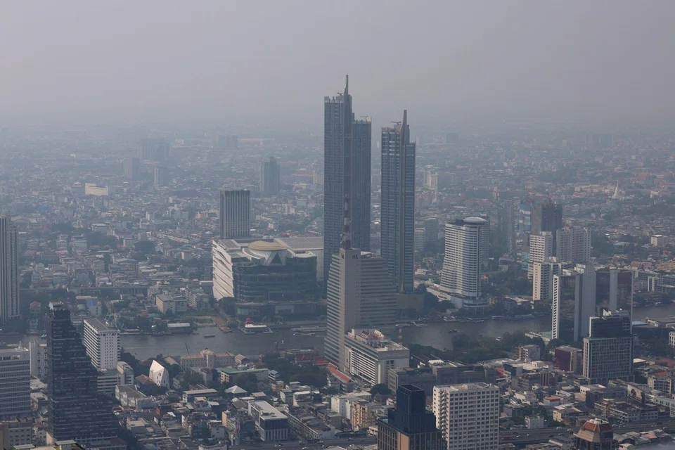 Buildings shrouded in smog in Bangkok. By Thursday morning, the Thai capital was the sixth most polluted major city in the world, according to IQAi.