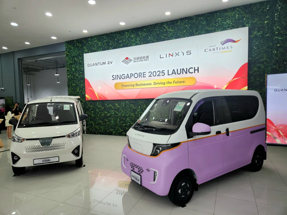 The Linxys G100R electric van (left) and G050 Piccolo electric micro van at the brand's launch in Singapore on Nov 11.