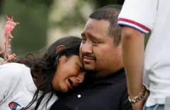 People react outside the Ssgt Willie de Leon Civic Centre, where students had been transported from Robb Elementary School after a shooting, in Uvalde, Texas, May 24, 2022.  
