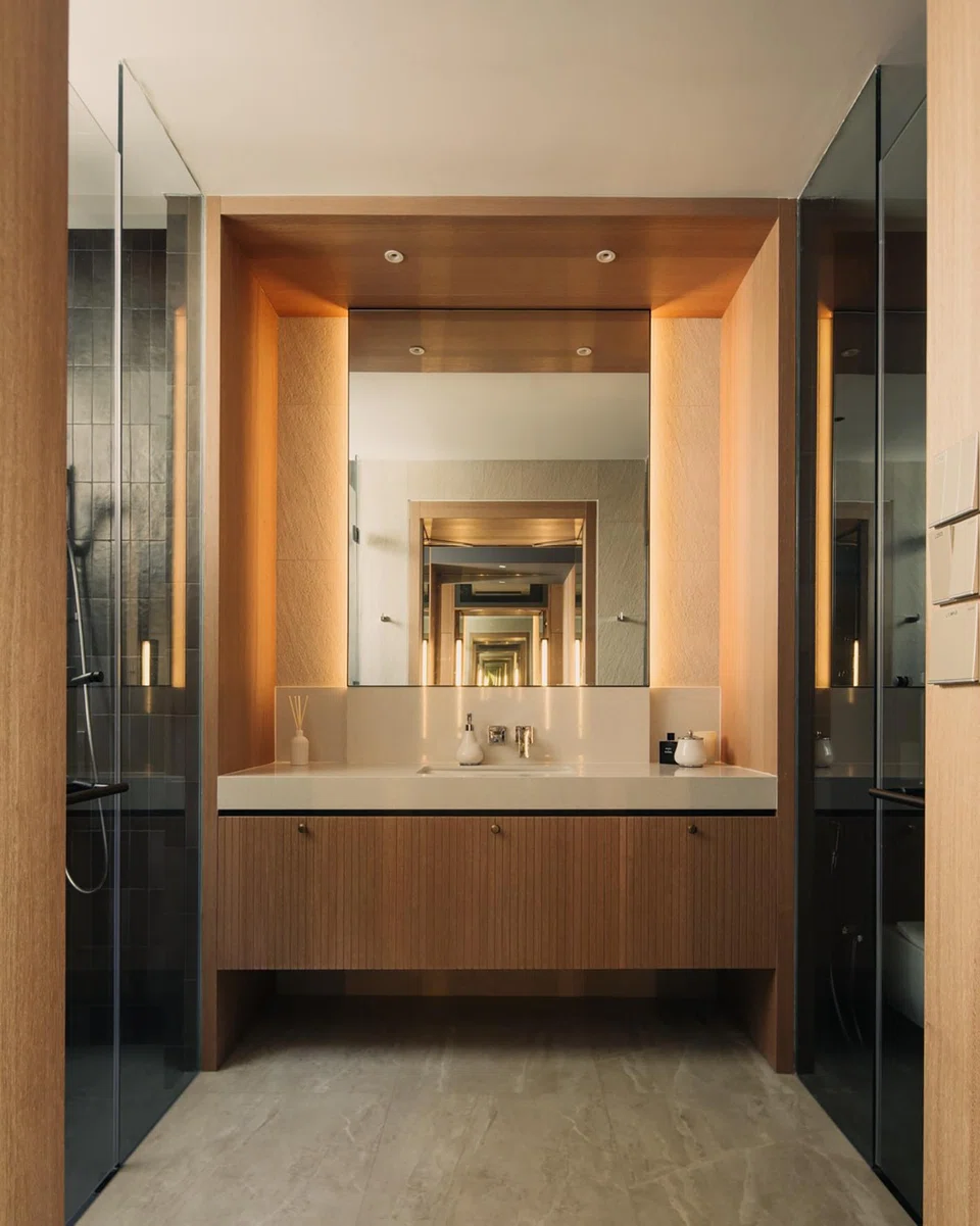 Warm tones define the master bathroom.