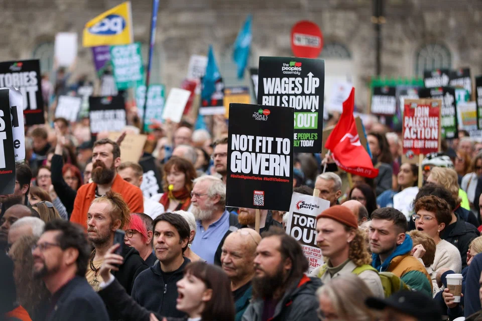 Protesters at a demonstration against the Conservative Party's annual autumn conference on Oct 2. There might have been plausible economic arguments for the UK's new policies, but political blunders have all but guaranteed that the Tories will lose the next election.
