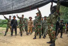 A delegation from the Asean Observer Team visiting an area along the Cambodia-Thailand border in Banteay Meanchey province, as both sides traded accusations of fresh clashes along their shared frontier.