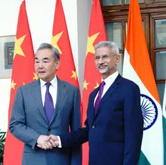 Chinese Foreign Minister Wang Yi (L) assured Indian Foreign Minister Subrahmanyam Jaishankar that Beijing is addressing India’s need for fertilisers, rare earths and tunnel boring machines.