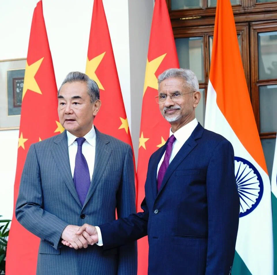 Chinese Foreign Minister Wang Yi (L) assured Indian Foreign Minister Subrahmanyam Jaishankar that Beijing is addressing India’s need for fertilisers, rare earths and tunnel boring machines.