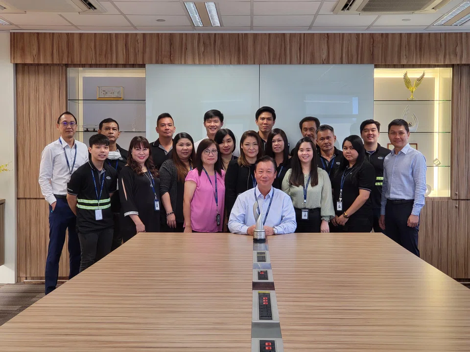 The CK Shipping team, led by group chief executive officer Ken Ngan (centre, seated). The company's presence ranges from Singapore, Malaysia and Vietnam, Hong Kong and China, to Australia, New Zealand, and Samoa.