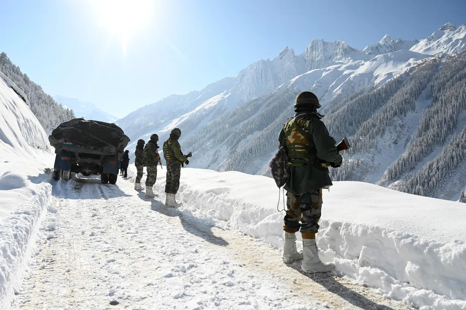 Indian army soldiers standing guard near the Zojila mountain pass in 2021. India and China have reached a deal to allow for regular patrols along the 3,488-km Himalayan border separating the nations.