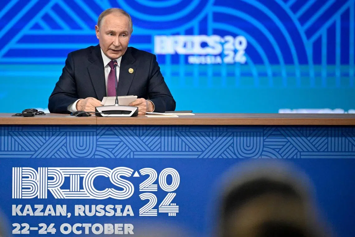 Russia's President Vladimir Putin speaks during the BRICS summit in Kazan on October 24, 2024. (Photo by Alexander NEMENOV / AFP)