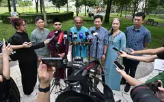 (From left) MP Louis Ng, Dr Syed Harun Alhabsyi, Law and Home Affairs Minister K Shanmugam, MPs Derrick Goh and Carrie Tan, and Jackson Lam speaking to the media outside Ahmad Ibrahim Mosque on March 31.