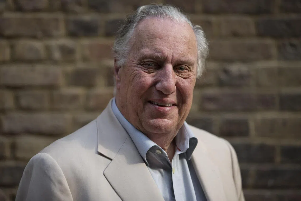 Forsyth posing for a photo in London in 2016. He presented himself as a cross between Ernest Hemingway and John le Carre.