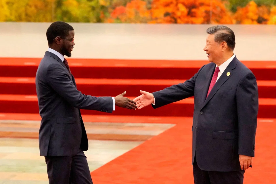 China President Xi Jinping (right) welcoming Senegal President Bassirou Diomaye Faye ahead of the dinner reception at the China-Africa forum. African leaders already secured a plethora of deals this week for greater cooperation in infrastructure, agriculture, mining, trade and energy.