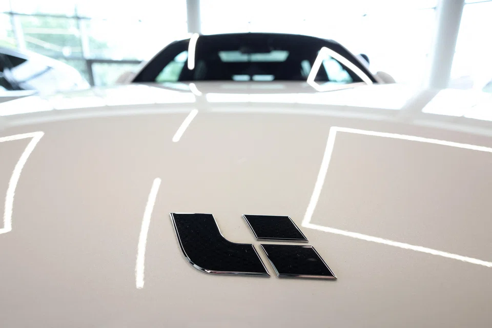 The Chinese carmaker (above, its logo) expects revenue for the period to range between 26.5 billion (S$4.9 billion) and 29.2 billion yuan.