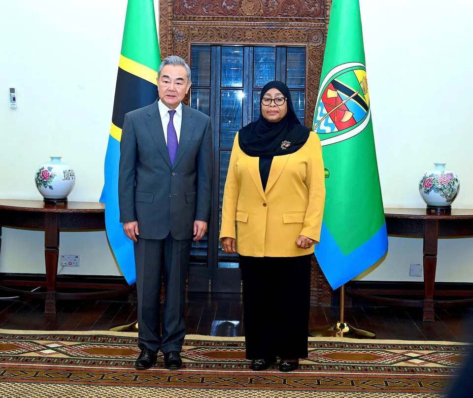 (From right) Tanzania President Samia Suluhu Hassan poses for a photograph with Chinese Foreign Minister Wang Yi in Dar es Salaam, Tanzania, Jan 10, 2026. 