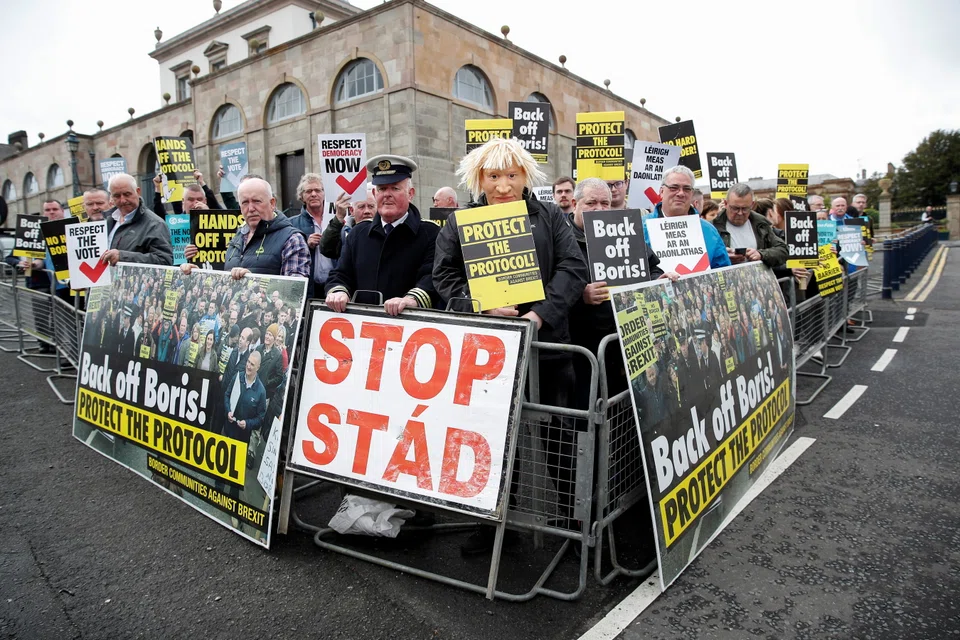 An anti-Brexit group protesting at the entrance to Hillsborough Castle before the arrival of British Prime Minister Boris Johnson in Hillsborough in Northern Ireland.