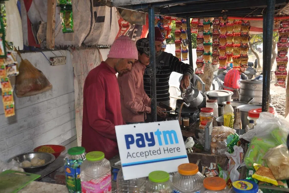 A tea stall in Dehradun that accepts mobile payment. Countries such as India have shown that it is possible to provide residents with a unique digital identifier, mandate the banks to provide low-cost, no-frills accounts, and install a system to facilitate interbank transactions through mobile phones.