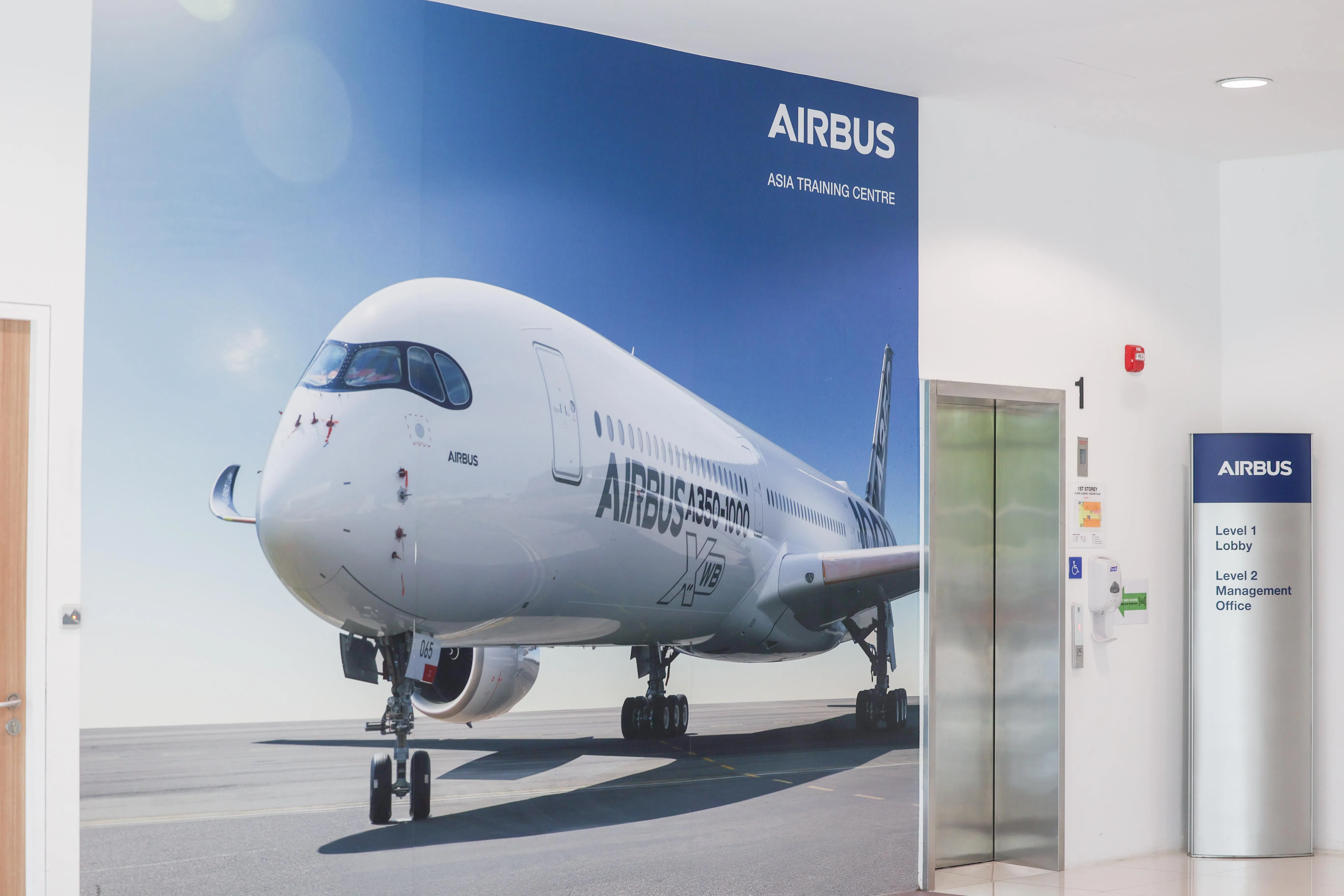 CMG20250113-NgohSB01/吴 先 邦 /吴 勇 达 /Launch of SP Group?s GET Control Smart Cooling Solution at Airbus Asia Training Centre [Airbus Asia Training Centre, 12 Seletar Aerospace Crescent, Singapore 797566]Generics of Airbus logo at Airbus Asia Training Centre