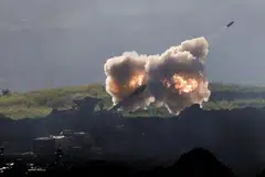 An Israeli artillery unit firing towards Lebanon on Mar 17. Emerging and Asia-focused markets have fallen some 5% to 9% since the crisis erupted on Feb 28.